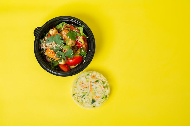 Artisan pizza topped with fresh herbs and vegetables